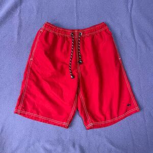 Men's Red swim trunks with white stitching and drawstring waist. Size: M.
